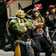 Ilustración para el artículo titulado Por algún motivo, la nueva película de las Tortugas Ninja parece mejor que la primera